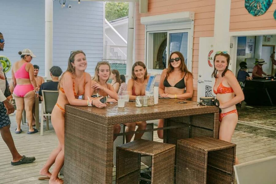 Nassau: Rose Island Swimming Pigs and Beach Day Group Tour - Water time and included island extras: observation deck, snorkel, kayak, and SUP